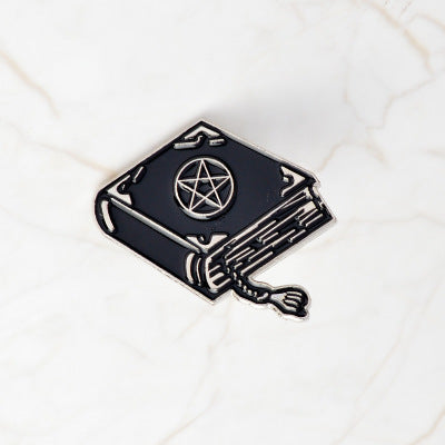 Witch enamel brooch
